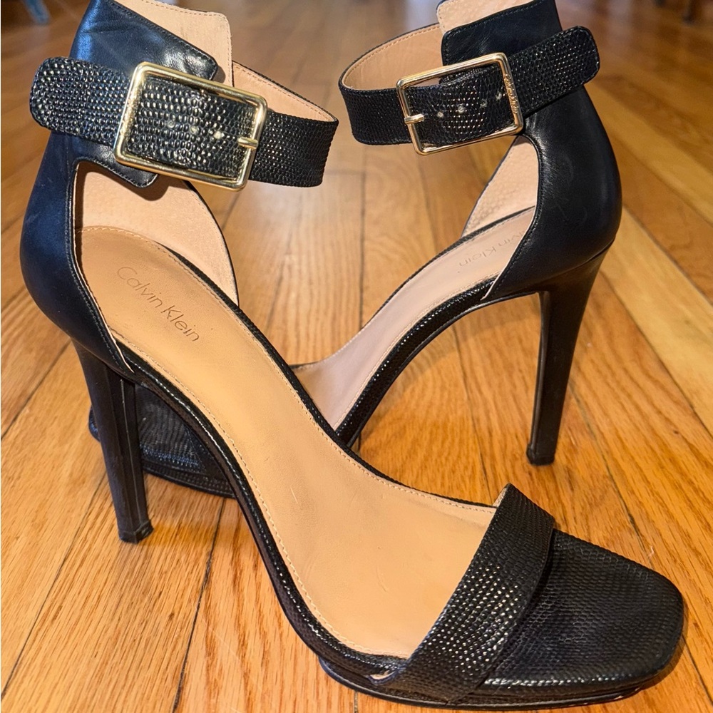 Calvin Klein Black Ankle-Strap Stiletto Heels with Gold Buckle